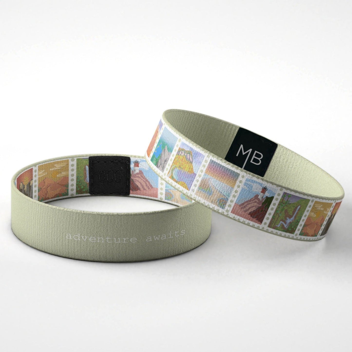 Adventure Awaits inspirational wristband Moxxie Band with nature scenes as a film reel on a light green background laying down view