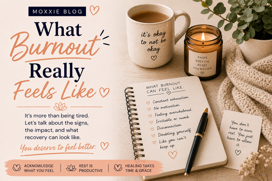 Moxxie Blog graphic titled ‘What Burnout Really Feels Like’ featuring warm navy and peach typography beside a cozy self-care scene with tea, candle, notebook, blanket, and handwritten burnout recovery reminders in soft neutral tones.