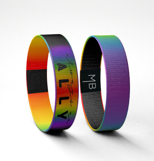 A Picture of Always an Ally inspirational wristband Moxxie Band black with a rainbow of colors supporting LGBTQ+ PRIDE standing up view